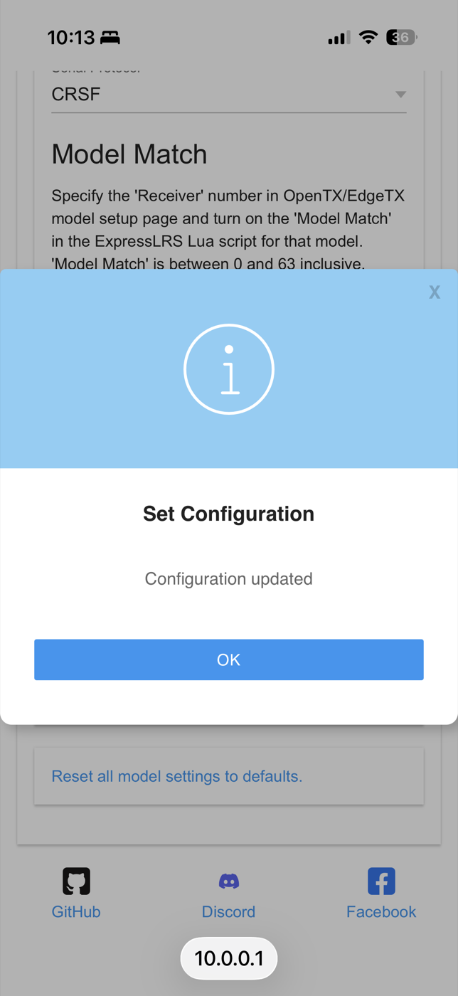 ExpressLRS Set Configuration dialog reading Configuration updated, with Serial Protocol CRSF visible behind it